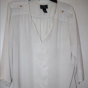 3 different white blouses